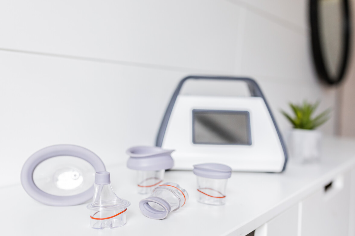 LymphaTouch® negative pressure therapy device with a range of treatment heads.
